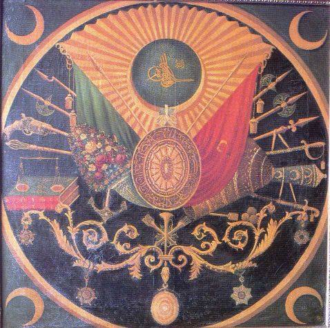 Ottoman Coat of Arms. In the Tughra
 itself the Inscription Abdulhamid Han el-Muzaffer Daima; In the
 Upper Right Hand Corner the Title "El-Gazi".